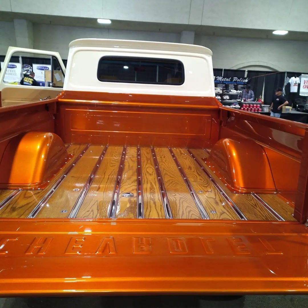 1965 Chevrolet C10 4x4 — Wood bed with polished strips.