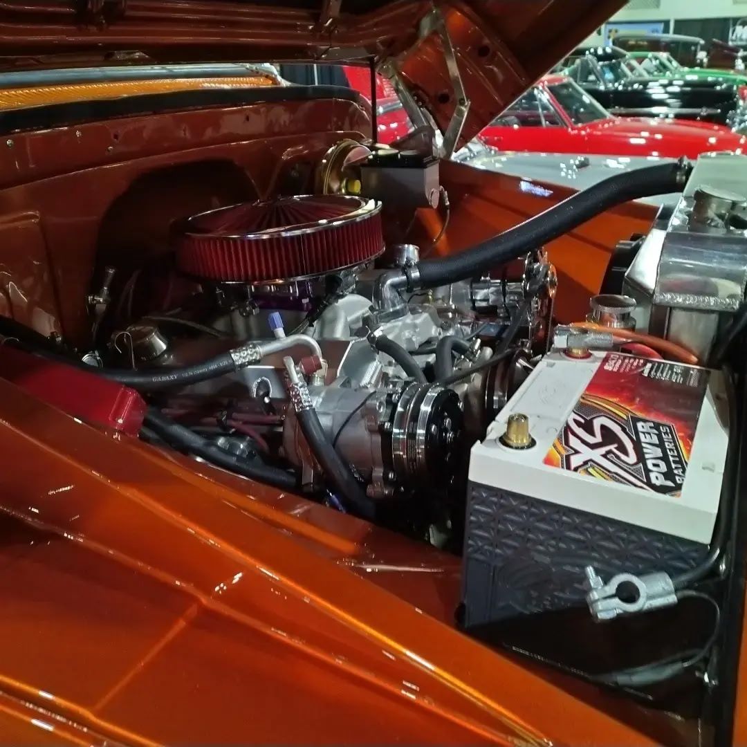 1965 Chevrolet C10 4x4 — Engine bay, dressed.