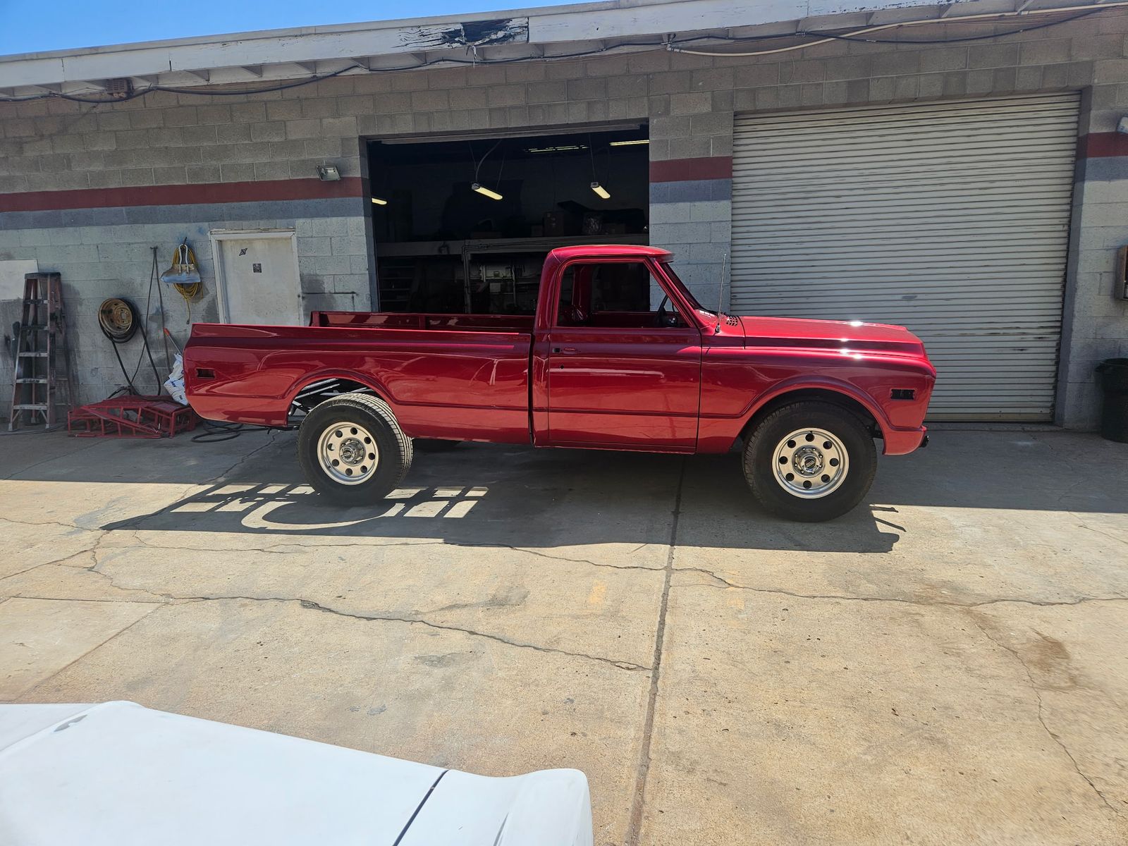 1969 Chevrolet C10 — Finished — full side profile out front.