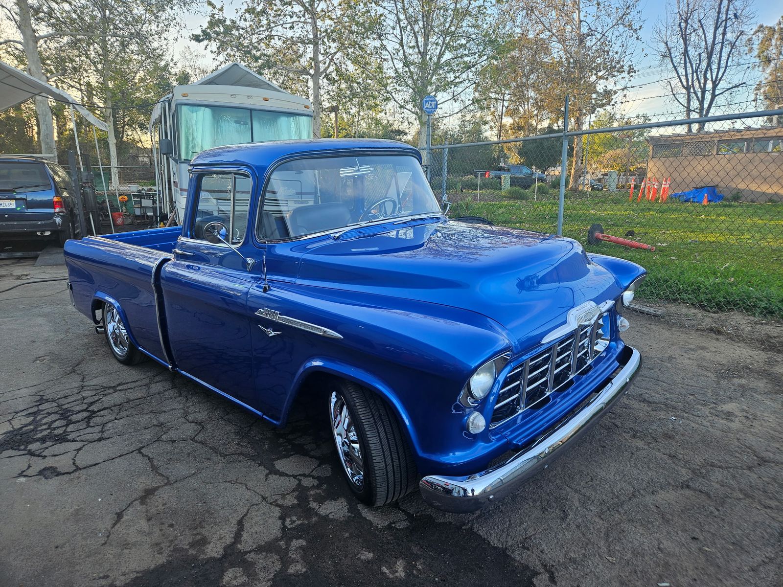 1956 Chevrolet 3100 — Front three-quarter, finished.