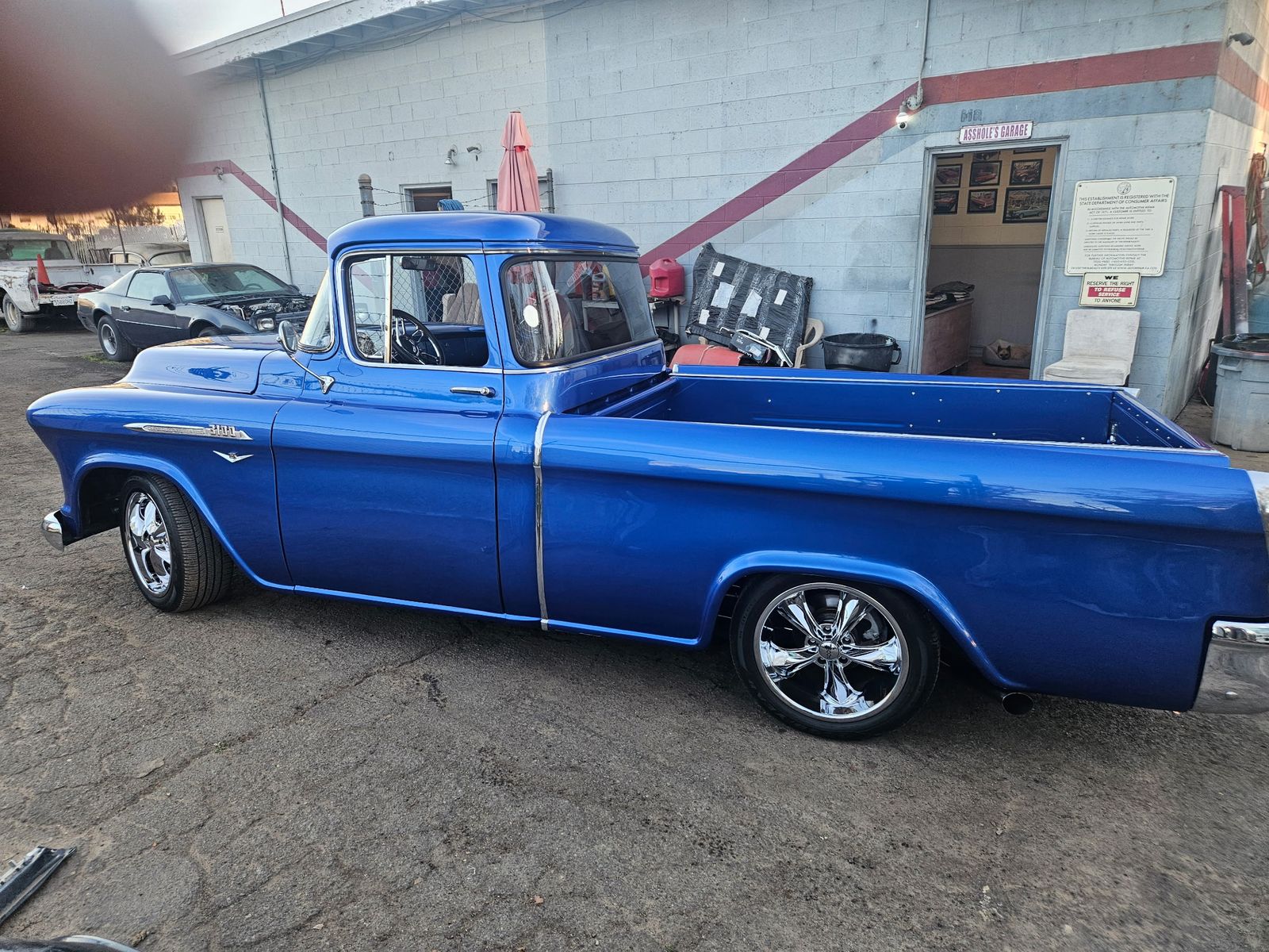 1956 Chevrolet 3100 — Full side profile.