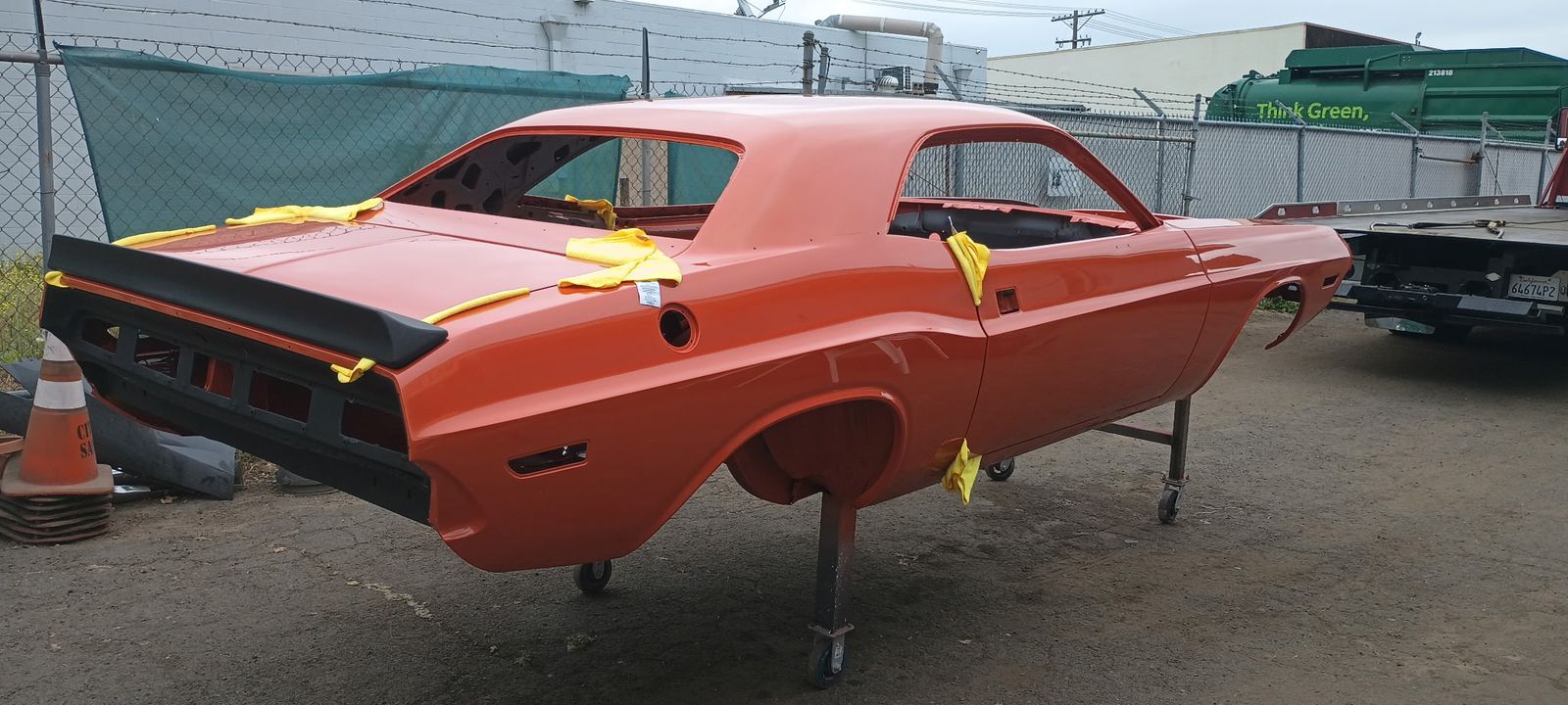 Dodge Challenger — Rear quarter and spoiler, masking still on.