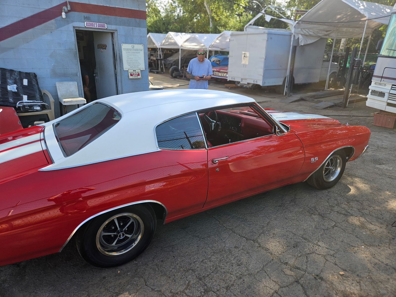 1970 Chevelle SS — Front three-quarter in the yard.
