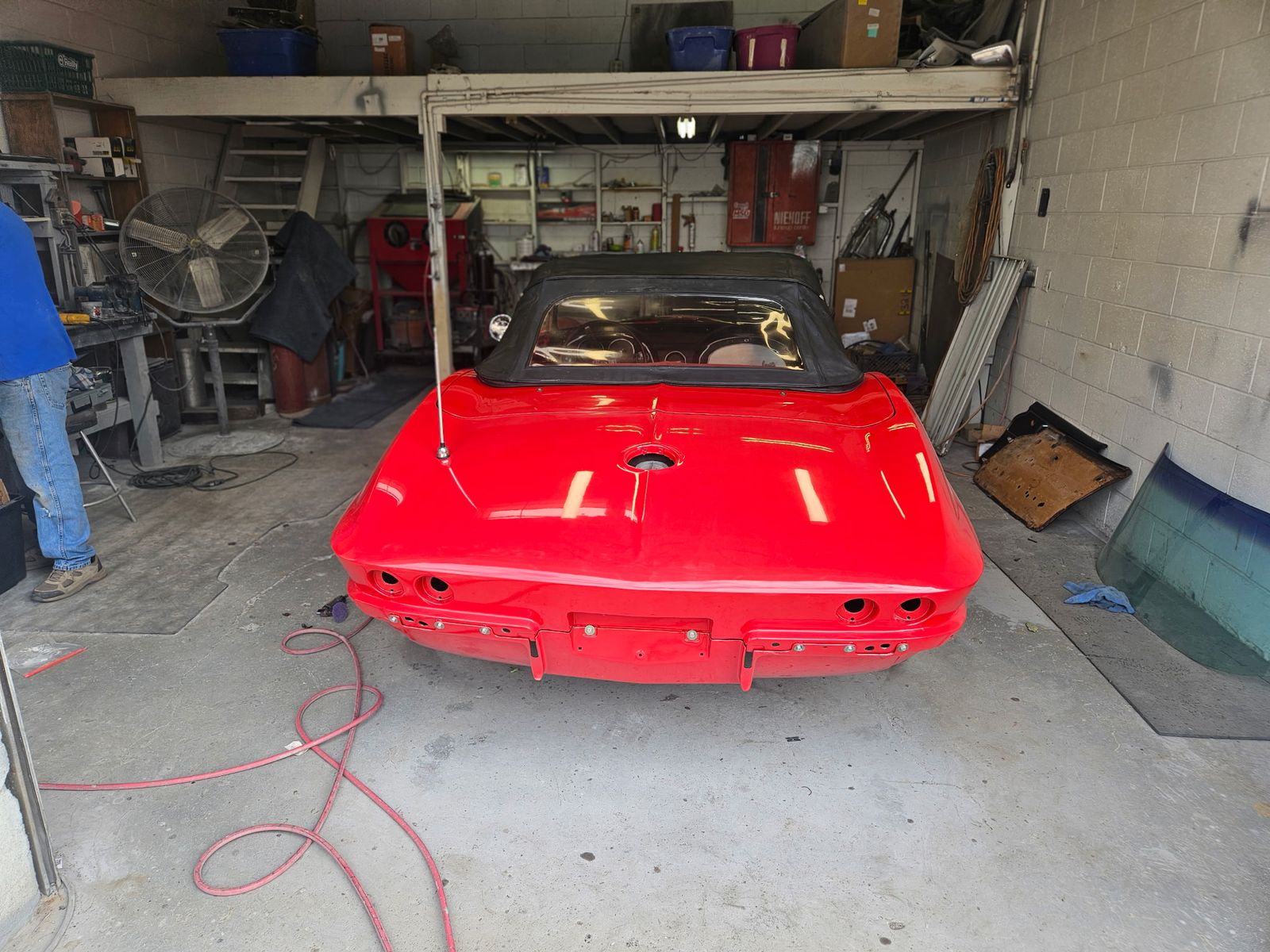 Corvette Sting Ray convertible fresh out of the paint booth with masking still applied