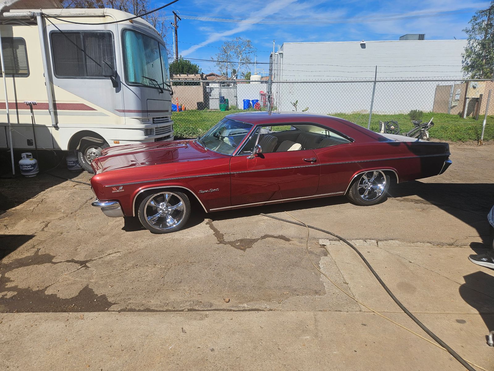 1966 Impala Super Sport — Side profile in the yard.