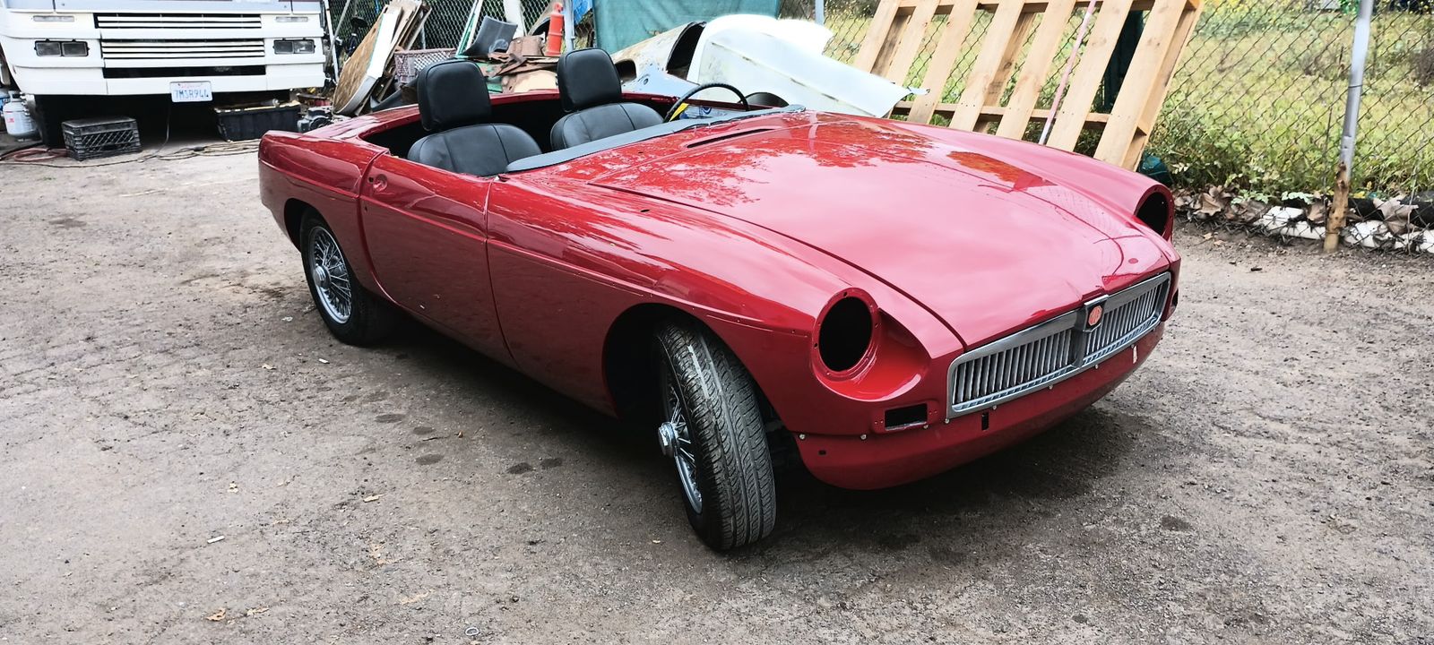 MGB Roadster — Front three-quarter, fresh paint.